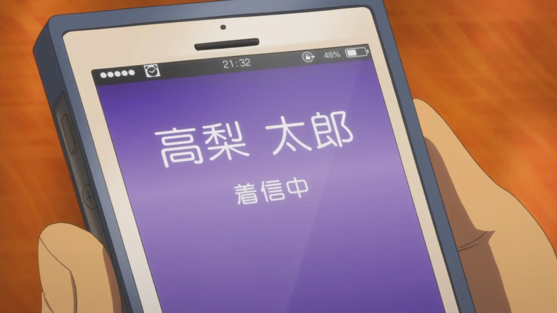 Endou's phone displaying 21:32.